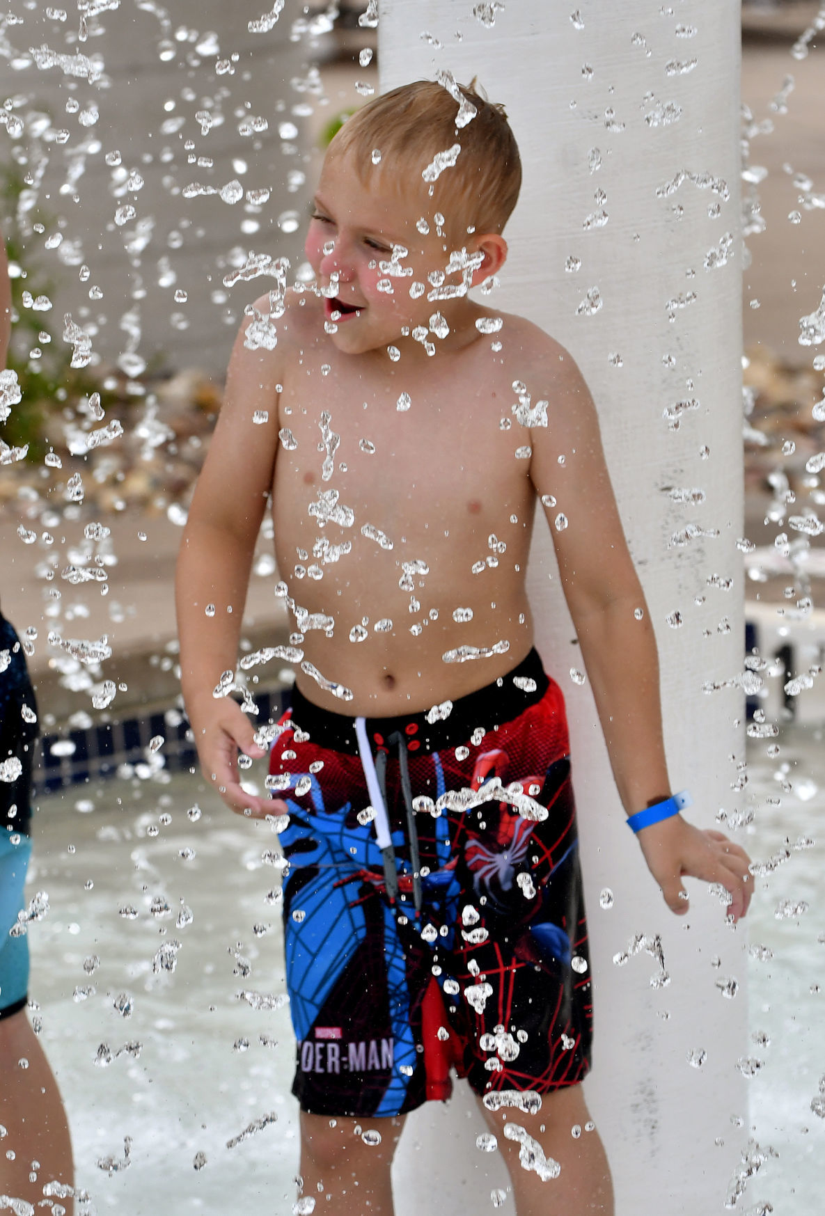People cooling off on a hot day at Splash Landing in Bettendorf.